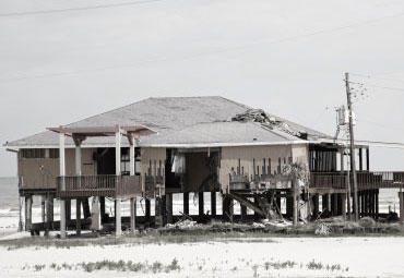 Wind damage - spray foam can help prevent uplift to Clearwater roofs